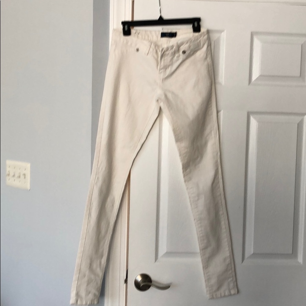 Off white colored ankle jeans. Skinny fit